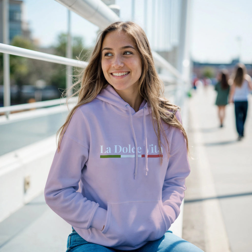 La Dolce Vita Hoodie modeled by a woman with minimalist Italian quote design.
